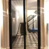 Porte vitrée immeuble haussmannien