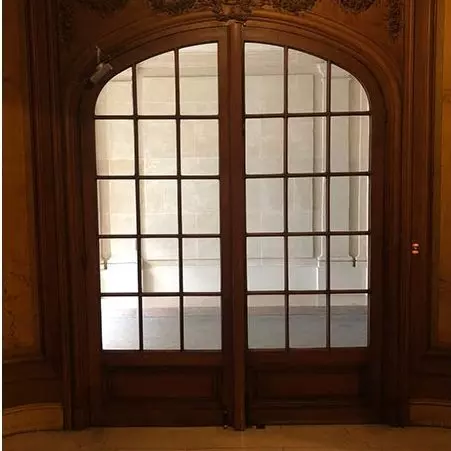 Porte vitrée cintrée boiserie ancienne